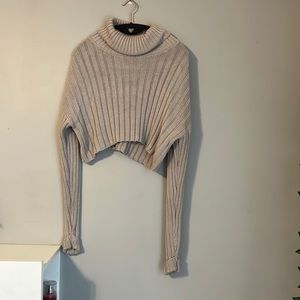 Knitted cream crop top.